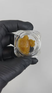 PUFFY Star Queen Badder: is a premium hybrid concentrate known for its rich, sweet caramel-vanilla flavor and powerful, long-lasting effects. Its bold aroma features a unique blend of funk, sharp cheese, and savory garlic, making it a standout choice for connoisseurs seeking a flavorful and potent experience.
