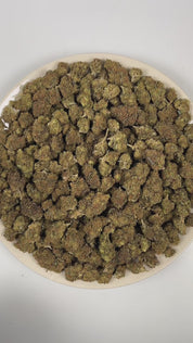 PUFFY Mango Dream is a sativa-dominant hybrid THCa strain meticulously blended from Mango and Blue Dream. The aroma blends tropical sweetness with sharp chemical notes and a bold diesel undertone. Visually, dense spring green buds with purple hues and fiery orange pistils are coated in sticky trichomes. Consumers often report euphoric effects accompanied by clear-headed focus, boosted energy, creative thinking, social confidence, talkative moods, and strong motivation.