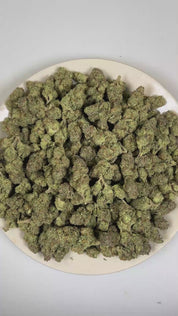 PUFFY Sharpie is an indica-dominant hybrid THCa strain developed from the powerhouse lineage of Biscotti × Jealousy × Sherb Bx. The aroma opens with sweet candy notes, followed by bold fuel undertones, and finishes with a distinctive chemical edge. Visually, dense forest green buds with purple hues and fiery orange pistils are coated in sticky trichomes. Consumers often report a euphoric uplift in mood accompanied by enhanced creativity, an easygoing social vibe and long-lasting physical calm. 