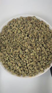PUFFY Apple Mac (smalls) is a balanced hybrid THCa strain, crafted by crossing the renowned MAC 1 with the potent Trophy Wife. The aroma is a distinctive blend of crisp apple, rich cheesy notes, and grounding earthy undertones. Visually, the dense buds feature forest‑to‑lime green calyxes with hints of purple, bright orange pistils, and a frosty coating of trichomes. Consumers often report an even blend of energizing mental effects and soothing body calm, which may help alleviate stress, anxiety, mood fluct