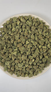 PUFFY Black Triangle (smalls) is an indica-dominant hybrid THCa strain emerging from the iconic fusion of Triangle Kush and ’88 G13 Hash Plant. The aroma bursts with gassy, skunky, and pine notes, creating a sharp, earthy fragrance. Visually, dense dark green buds with purple hues and fiery orange pistils are coated in sticky trichomes. Consumers often report feeling euphoric and relaxed, accompanied by a calm mood and a mild mental uplift that gently settles both mind and body.