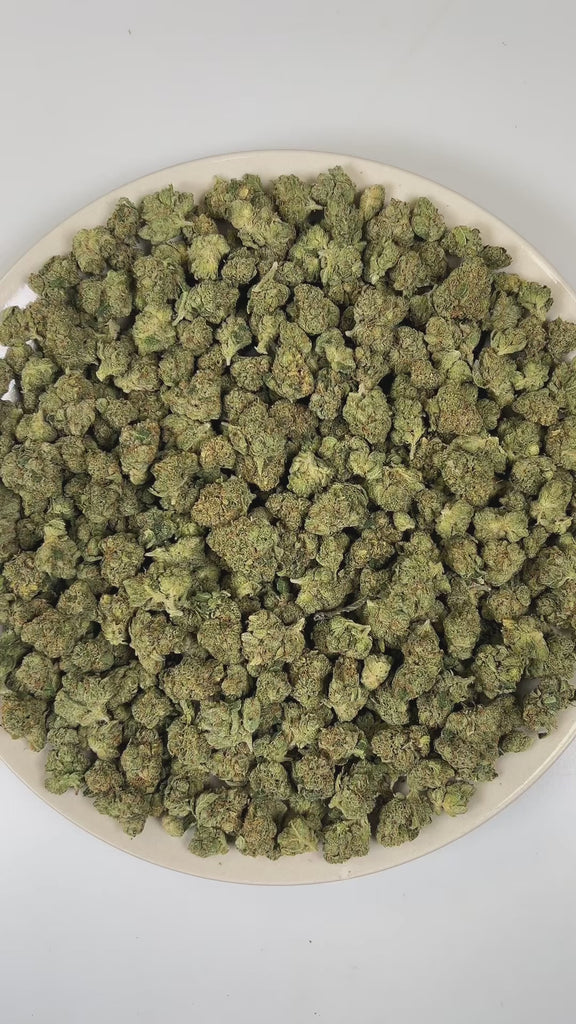PUFFY Black Triangle (smalls) is an indica-dominant hybrid THCa strain emerging from the iconic fusion of Triangle Kush and ’88 G13 Hash Plant. The aroma bursts with gassy, skunky, and pine notes, creating a sharp, earthy fragrance. Visually, dense dark green buds with purple hues and fiery orange pistils are coated in sticky trichomes. Consumers often report feeling euphoric and relaxed, accompanied by a calm mood and a mild mental uplift that gently settles both mind and body.