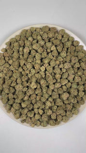PUFFY Guava Punch (smalls) is an indica-dominant THCa strain created from the exotic blend of Double Guava and Nancy Marie Punch. The aroma unfolds with lush, ripe mango sweetness, tropical guava richness, and bright, juicy pineapple notes. Visually, dense forest green buds with purple hues and fiery orange pistils are coated in sticky trichomes. Consumers often report a euphoric, relaxed body high along with heightened positivity, reduced tension, and an enhanced appetite. 