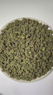 PUFFY Tropical Runtz (smalls) is a sativa-dominant hybrid THCa strain developed by combining the renowned genetics of Runtz and Tropic Truffle. The aroma is a delightful blend of candy-like sweetness, juicy fruit notes, and vibrant tropical nuances. Visually, dense forest green buds with purple hues and fiery orange pistils are coated in sticky trichomes. Consumers often report an uplifting wave of euphoria that sparks creativity, sharpens focus, encourages sociability, and gradually settles into a calm, de