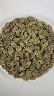 PUFFY Chocolate Mintz is an indica-dominant hybrid THCa strain, crafted from the distinctive pairing of Emerald OG and Granddaddy Purple. The aroma is a refreshing blend of rich chocolate, cool mint, and invigorating menthol, creating a sweet yet crisp sensory experience. Visually, dense forest-green buds with hints of purple are threaded with fiery orange pistils and coated in a sparkling layer of sticky trichomes. Consumers often report a euphoric experience paired with full-body relaxation, a calm and pe