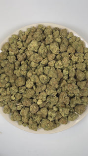 PUFFY Super Mango Haze is a sativa-dominant hybrid THCa strain bred from the exceptional pairing of Green Crack and Tropical Heat. The aroma is a striking blend of sharp chemicals, sweet tropical notes, and a pungent hint of ammonia. Visually, dense forest green buds with purple hues and fiery orange pistils are coated in sticky trichomes. Consumers often report a strong cerebral effect that is euphoric, energetic, and focused, delivering a creative and uplifting mood boost while also being commonly sought 