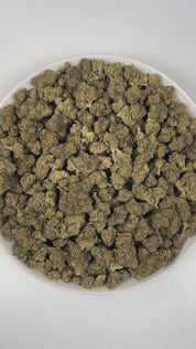PUFFY Double Blue is an indica-dominant hybrid THCa strain, crafted from the distinctive pairing of Blue Dream and Double Gum. The aroma opens with rich, juicy berries, intertwined with a distinct gassy punch and grounded by warm, earthy woody undertones. Visually, dense forest green buds with purple hues and fiery orange pistils are coated in sticky trichomes. Consumers often report feeling euphoric and uplifted with a clear, focused mind and soothing body relaxation, easing insomnia, pain, stress, anxiety