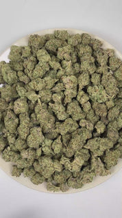PUFFY ORZ is an indica-dominant hybrid THCa strain derived from the celebrated fusion of  Cookies and Cream and Secret Weapon. The aroma presents a rich fusion of warm tobacco, smooth vanilla, and fresh-baked dough. Visually, dense forest green buds with hints of purple are threaded with fiery orange pistils and coated in a sparkling layer of sticky trichomes. The consumers often report a euphoric experience accompanied by a calm, mentally relaxed state that gently soothes the mind and encourages a grounded