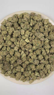 PUFFY Blueberry Punch is a balanced hybrid THCa strain produced from the distinctive union of Blueberry and Romulan. The aroma opens with ripe blueberries, layered with a distinctive beer-like maltiness and a tangy sour finish. Visually, dense forest green buds with purple hues and fiery orange pistils are coated in sticky trichomes. Consumers often report a euphoric, lively, and creatively inspired mindset alongside a soothing physical calm and enhanced appetite. 