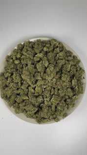 PUFFY Alien OG is a balanced hybrid THCa strain, spawned from the renowned pairing of Tahoe OG and Alien Kush. The aroma is rich with pine and classic OG notes, complemented by warm, aromatic spices. Visually, dense green buds with purple hues and fiery orange pistils are coated in sticky trichomes. Consumers often report a fast-onset cerebral high that brings euphoria, uplifted mood, creativity, and focus, followed by soothing body relaxation.  