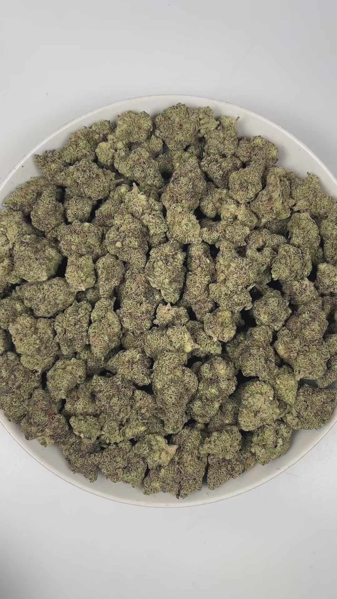 PUFFY Purple Kush is a pure indica THCa strain originating from a cross of Hindu Kush and Purple Afghani. The aroma is a bold blend of classic Kush, pungent earthiness, and a sharp hint of onions. Visually, dense forest green buds with purple hues and fiery orange pistils are coated in sticky trichomes. Consumers often report a blissful sense of euphoria, deep relaxation, and a noticeable boost in appetite.