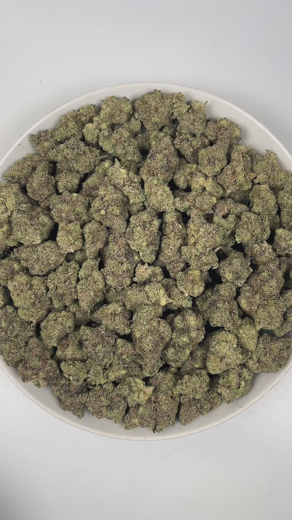 PUFFY Purple Kush is a pure indica THCa strain originating from a cross of Hindu Kush and Purple Afghani. The aroma is a bold blend of classic Kush, pungent earthiness, and a sharp hint of onions. Visually, dense forest green buds with purple hues and fiery orange pistils are coated in sticky trichomes. Consumers often report a blissful sense of euphoria, deep relaxation, and a noticeable boost in appetite.