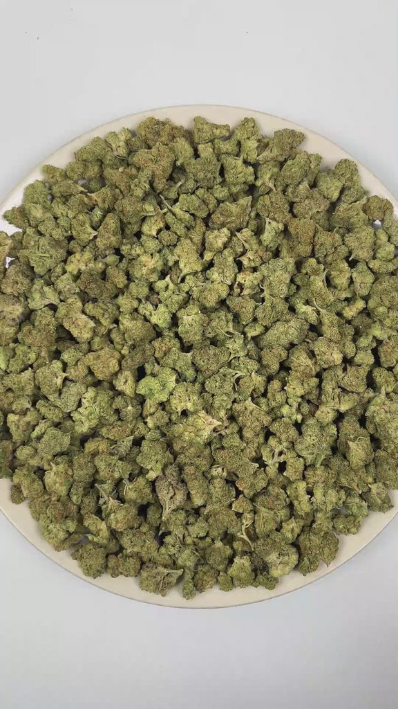 PUFFY Frosted Cherry Cookies (smalls) is a balanced hybrid THCa strain resulting from the strategic pairing of Cherry Cookies and The White. The aroma is rich and inviting, blending doughy warmth with deep woody undertones and a subtle layer of aromatic spices. Visually, dense deep forest green buds with purple hues and fiery orange pistils are coated in sticky trichomes. Consumers often report a euphoric, mood-enhancing clarity at onset, followed by a gentle easing into mental calm and stress relief, befor