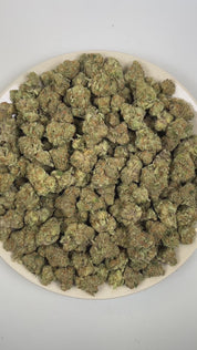 PUFFY Strawberry Cooler is an indica-dominant hybrid THCa strain prepared from a premium blend of  Strawberry Guava and Kush Mints. The aroma bursts with a vibrant fusion of tropical fruit sweetness, layered with juicy melon undertones and a bold, gassy diesel finish. Visually, dense forest green buds with purple hues and fiery orange pistils are coated in sticky trichomes. Consumers often report an experience characterized by euphoric, joyful, and deeply relaxed effects with an uplifting sense of mental cl
