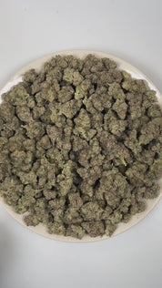 
PUFFY French Lotus is an indica-dominant hybrid THCa strain born from the celebrated genetics of Blue Lotus and FKAKL. The aroma is a bold fusion of rich tobacco, sharp gasoline, and deep, earthy dank notes. Visually, dense forest green buds with purple hues and fiery orange pistils are coated in sticky trichomes. Consumers often report an euphoric, uplifting head high accompanied by a deeply soothing body relaxation that promotes overall calm and well-being.
