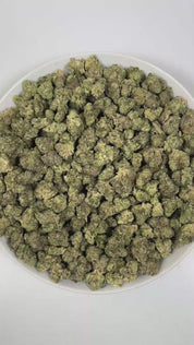 PUFFY Tiger Mintz is an indica-dominant hybrid THCa strain, crafted from the masterful cross of Orange Push Pop × Animal Mintz. The aroma is sweet and inviting, with refreshing minty notes and a hint of juicy berry that lingers pleasantly. Visually, dense green buds with purple hues and fiery orange pistils are coated in sticky trichomes. Consumers often report experiencing deep relaxation and body calm, euphoric mood uplift, and a heightened sense of creativity or focus.