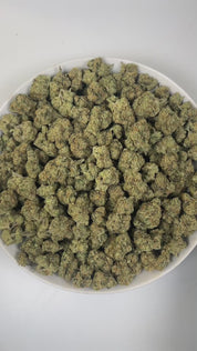 PUFFY White Fire OG is a balanced hybrid THCa strain, crafted from the legendary lineage of Fire OG and The White. The aroma greets the senses with earthy undertones, sharp pine notes, and a distinctive gassy punch. Visually, dense light-green buds with hints of purple, bright orange pistils, and a thick coating of sparkling trichomes. Consumers often experience an immediate spark of mental clarity and creative energy that gently flows into a calming, tension-relieving body high.