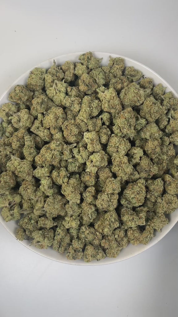 PUFFY White Fire OG is a balanced hybrid THCa strain, crafted from the legendary lineage of Fire OG and The White. The aroma greets the senses with earthy undertones, sharp pine notes, and a distinctive gassy punch. Visually, dense light-green buds with hints of purple, bright orange pistils, and a thick coating of sparkling trichomes. Consumers often experience an immediate spark of mental clarity and creative energy that gently flows into a calming, tension-relieving body high.