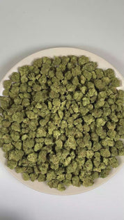 PUFFY Banjo (smalls) is a balanced hybrid THCa strain derived from the premium lineage of Boost and Tangelo. The aroma opens with sharp pine and pungent diesel notes, finishing with a bold, distinctive hint of chemicals. Visually, dense forest green buds with hints of purple are threaded with fiery orange pistils and coated in a sparkling layer of sticky trichomes. Consumers often report an uplifting euphoric mood lift accompanied by improved mental clarity and focus, along with a gentle full-body relaxatio