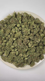 PUFFY Omega is an indica-dominant hybrid THCa strain emerged from the powerhouse cross of White Widow × Kush × NYC Diesel × Permafrost. The aroma opens with classic OG and earthy herbal notes, finishing with a crisp, refreshing hint of pine. Visually, dense deep forest green buds with purple hues and fiery orange pistils are coated in sticky trichomes. Consumers often report feeling euphoric, relaxed, and uplifted, promoting a positive mood while maintaining a clear sense of focus. 