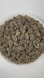 PUFFY Supreme Gelato is an indica-dominant hybrid THCa strain, crafted from the legendary lineage of Supreme Ruckus with Gelato #41. The aroma is a delightful blend of sweet berries, sharp diesel, and sugary candy, creating a rich and enticing scent that immediately captures the senses. Visually, dense forest green buds with purple hues and fiery orange pistils are coated in sticky trichomes. Consumers often report a well‑balanced high that begins with an uplifting, clear‑headed cerebral euphoria and gradua