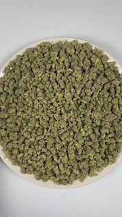 PUFFY Key Lime Jack (smalls) is a balanced hybrid THCa strain derived from the skillfully blended cross of Bling Cheesecake and Jack Herer. The aroma unfolds with distinct chemical undertones layered over crisp pine freshness and bright citrus zest. Visually, dense forest green buds with purple hues and fiery orange pistils are coated in sticky trichomes. Consumers often report feeling euphoric, uplifted, and focused, accompanied by a clear-headed sense of relaxation that keeps the mind sharp and the body a