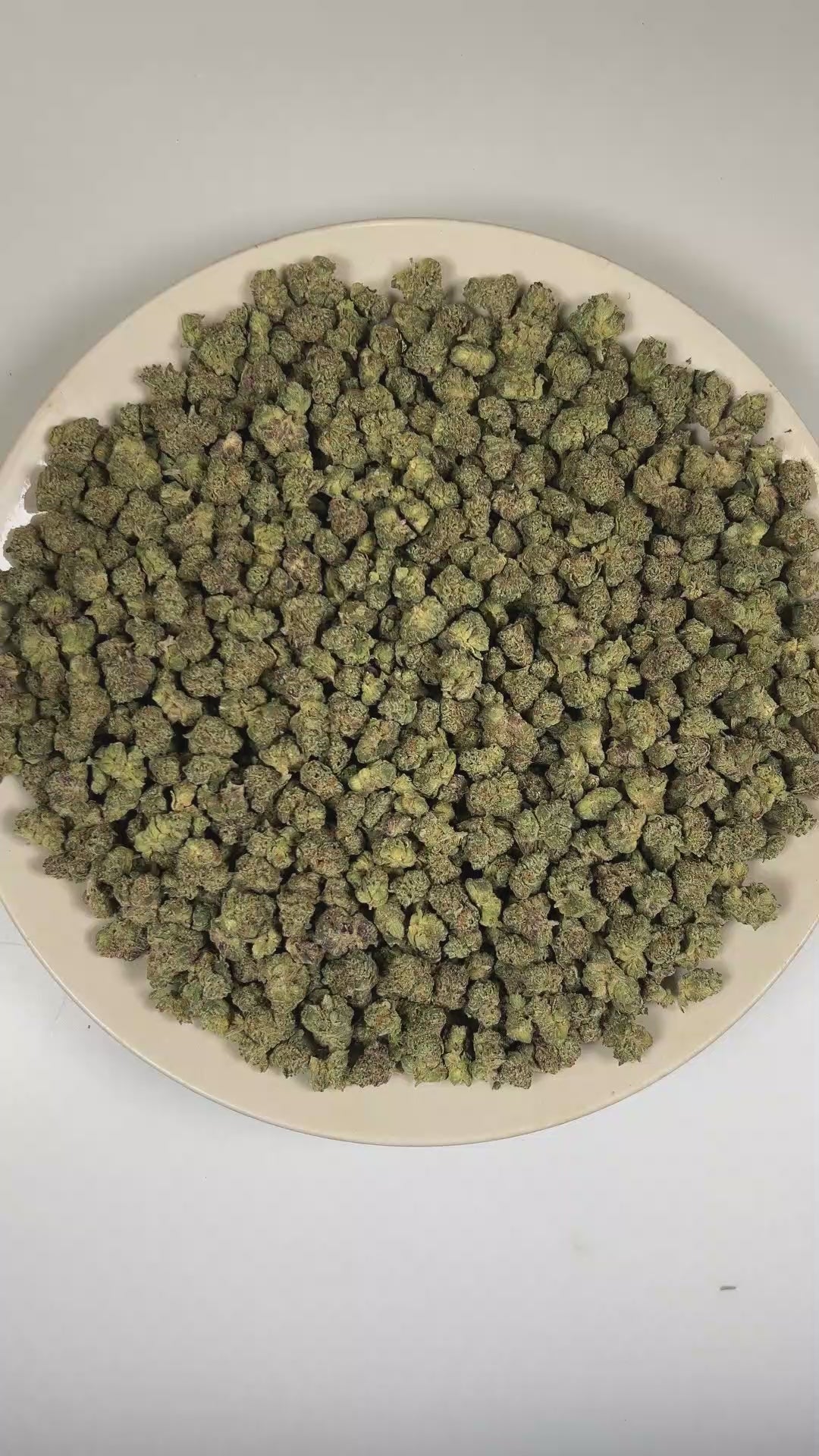 PUFFY Iced Sangria (smalls) is a balanced hybrid THCa strain with an officially unconfirmed genetic lineage, as its exact parentage has not been publicly disclosed. The aroma opens with rich roasted coffee and sweet fruity notes, gradually unfolding into a smooth, earthy finish. Visually, dense deep forest green buds with purple hues and fiery orange pistils are coated in sticky trichomes. Consumers often report a euphoric, calming, and deeply relaxing experience that promotes a peaceful state of mind and o