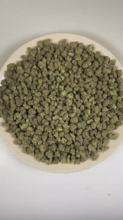 PUFFY Iced Sangria (smalls) is a balanced hybrid THCa strain with an officially unconfirmed genetic lineage, as its exact parentage has not been publicly disclosed. The aroma opens with rich roasted coffee and sweet fruity notes, gradually unfolding into a smooth, earthy finish. Visually, dense deep forest green buds with purple hues and fiery orange pistils are coated in sticky trichomes. Consumers often report a euphoric, calming, and deeply relaxing experience that promotes a peaceful state of mind and o
