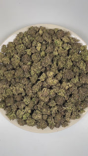 PUFFY Sherb Pop is a balanced hybrid THCa strain meticulously blended from Sunset Sherbet and Orange Push Pop. The aroma is a bold blend of smoky undertones, heavy gassy notes, and sharp diesel fuel. Visually, dense green buds with purple hues and fiery orange pistils are coated in sticky trichomes. Consumers often report an initial euphoric mood lift and gentle cerebral sweetness that gradually transitions into deep body relaxation and calm.
