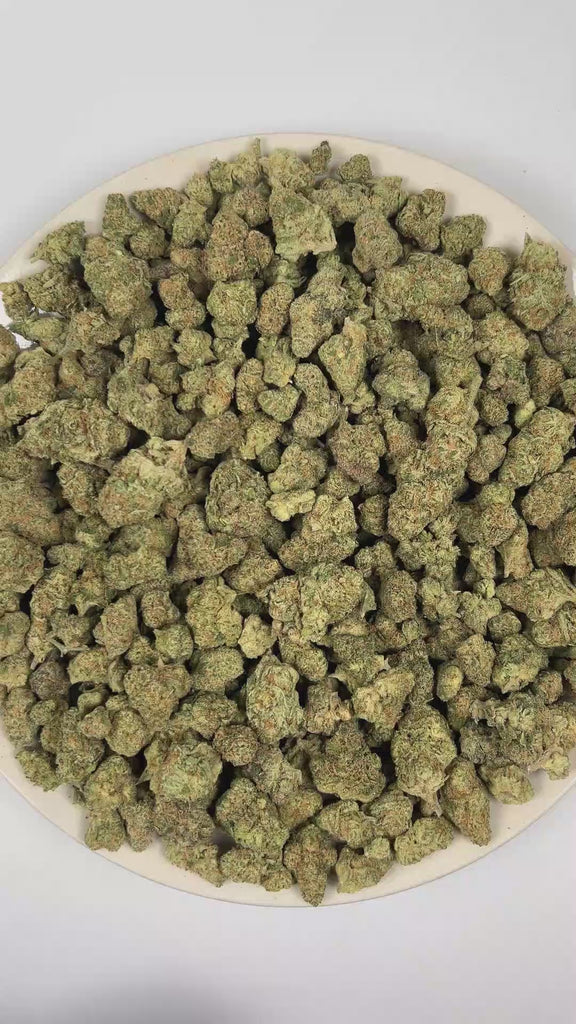 PUFFY Assorted Exotics is a curated assortment of exotic strains, featuring Blue Cookie Monster, Pineapple Fizz, Papaya Punch, Red Velvet, Maria, Gelato, Lemon Kush, Rockets, Dutch Punch, Banana Jax, and Banana OG x Banana Frosting. The aroma is a bold fusion of diesel fuel notes, bright citrus zest, and pungent skunky undertones, creating a sharp and intensely fragrant scent profile. 
