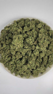 PUFFY Jack Herer is a sativa-dominant hybrid THCa strain, bred from a legendary three‑way genetic cross of Northern Lights #5, Shiva Skunk, and Haze. The aroma is a vibrant blend of citrus and zesty notes accented by a sharp chemical undertone. Visually, dense green buds with purple hues and fiery orange pistils are coated in sticky trichomes. Consumers often report euphoric, energetic, focused, and uplifting sensations, along with potential relief from stress and anxiety and a noticeable boost in creativit