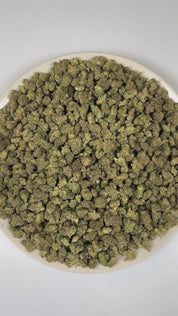 PUFFY Kandy Kush (smalls) is a balanced hybrid THCa strain formed by the classic fusion of OG Kush and Trainwreck. The aroma is a vibrant blend of sweet candy-like notes layered with zesty lime and a bold, gassy undertone. Visually, dense forest green buds with purple hues and fiery orange pistils are coated in sticky trichomes. Consumers often report an initial mild cerebral stimulation that quickly transitions into euphoric effects and a full-bodied physical sensation.