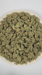 PUFFY Blue Dream is a sativa-dominant hybrid THCa strain, crafted from the lush pairing of Blueberry and Haze. The aroma is dominated by ripe blueberry sweetness, complemented by gassy undertones and a deep, pungent edge. Visually stunning, its dense, bright green buds are accented by deep blue hues, fiery orange pistils, and a generous dusting of icy trichomes making it as eye-catching as it is effective. Consumers often report a euphoric, uplifting head high that flows into a gentle, motivating body buzz,