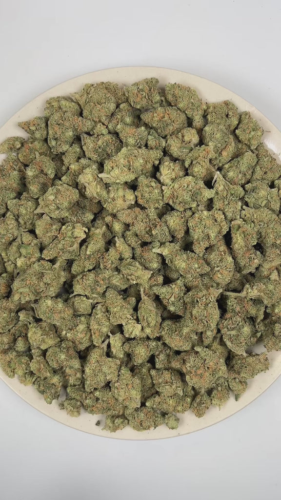 PUFFY Blue Dream is a sativa-dominant hybrid THCa strain, crafted from the lush pairing of Blueberry and Haze. The aroma is dominated by ripe blueberry sweetness, complemented by gassy undertones and a deep, pungent edge. Visually stunning, its dense, bright green buds are accented by deep blue hues, fiery orange pistils, and a generous dusting of icy trichomes making it as eye-catching as it is effective. Consumers often report a euphoric, uplifting head high that flows into a gentle, motivating body buzz,