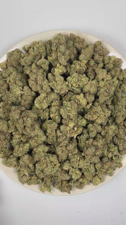PUFFY Holy Grail OG is an indica-dominant hybrid THCa strain, born from the renowned fusion of Kosher Kush and OG Kush #18. The aroma is a bold blend of classic Kush richness, sharp pine freshness, and a pungent diesel undertone. Visually, dense green buds with hints of purple are threaded with fiery orange pistils and coated in a sparkling layer of sticky trichomes. Consumers often report a calming body relaxation paired with euphoric uplift, happy and mellow moods, and occasional bursts of creativity, wit