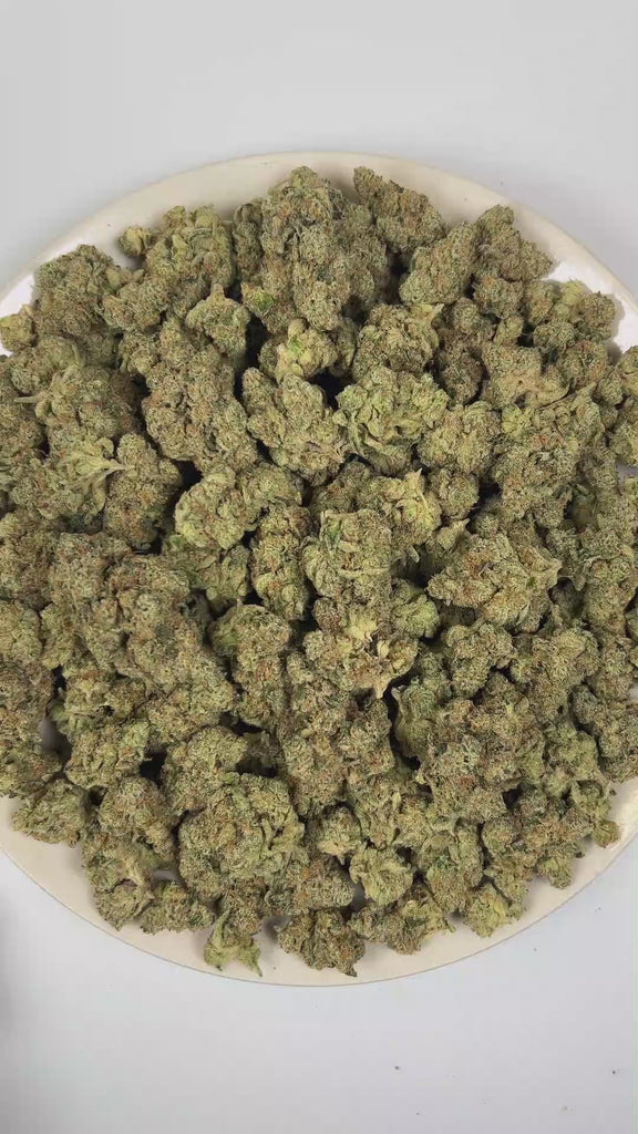 PUFFY Holy Grail OG is an indica-dominant hybrid THCa strain, born from the renowned fusion of Kosher Kush and OG Kush #18. The aroma is a bold blend of classic Kush richness, sharp pine freshness, and a pungent diesel undertone. Visually, dense green buds with hints of purple are threaded with fiery orange pistils and coated in a sparkling layer of sticky trichomes. Consumers often report a calming body relaxation paired with euphoric uplift, happy and mellow moods, and occasional bursts of creativity, wit
