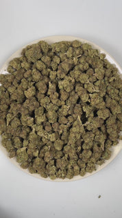 PUFFY Laughing Buddha is a sativa-dominant hybrid THCa strain derived from the storied genetics of Thai and Jamaican lineage. The aroma opens with a refined note of sage, followed by a rich herbal character and a calming tea-like finish. Visually, dense forest green buds with purple hues and fiery orange pistils are coated in sticky trichomes. Consumers often report a euphoric, energetic and uplifting experience accompanied by enhanced creativity and an inspired mental clarity. 