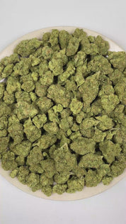 PUFFY Guava is a sativa-dominant hybrid THCa strain bred through the premium union of Gelato and Stardawg. The aroma opens with bold cheesy notes, followed by a pungent earthiness and an unmistakably funky, stinky finish. Visually, the buds are dense, with green tones, bright orange pistils, and a frosty trichome coating. Consumers often report a euphoric shift in mood paired with an uplifted, content state that enhances creativity and supports a more focused, sharp mental clarity.  