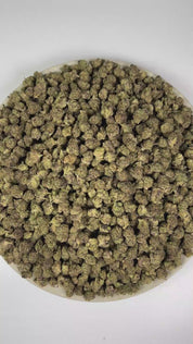 PUFFY Hi Chew (smalls) is an indica-dominant hybrid THCa strain born through the exceptional pairing of Old Time Indiana Bubble Gum and MAC 1. The aroma blends zesty citrus notes with sweet, fruity undertones and a pungent fuel-like finish. Visually, dense forest green buds with purple hues and fiery orange pistils are coated in sticky trichomes. Consumers often report euphoric and uplifting effects accompanied by a soothing sense of relaxation.