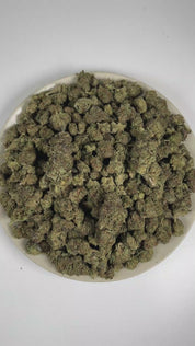 PUFFY Grape Pie is an indica-dominant hybrid THCa strain expertly crafted from the flavorful pairing of Cherry Pie and Grape Stomper. The aroma is rich with ripe grape and velvety cream notes, complemented by a smooth, indulgent finish of vanilla. Visually, dense forest green buds with purple hues and fiery orange pistils are coated in sticky trichomes. Consumers often report a refined euphoric and uplifting experience, unfolding into a smooth, deeply relaxed, and pleasantly serene state. 