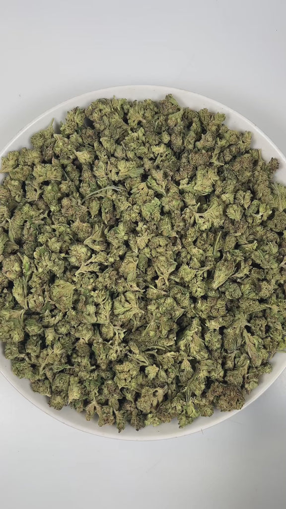 PUFFY Pink Guava (smalls) is a balanced hybrid THCa strain that blends the best of Nepali Pink and Guava. The aroma unfolds with a creamy richness, layered over soft, nutty notes of rice and a subtle, lingering sweetness. Visually, dense pine green buds with purple hues and fiery orange pistils are coated in sticky trichomes. Consumers often report experiencing euphoria, happiness, relaxation, and enhanced focus, enjoying a balanced mental stimulation paired with calming body effects.