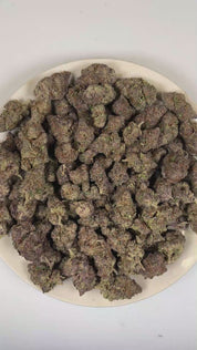 PUFFY Orange Z is a balanced hybrid THCa strain meticulously crafted through the expert cross of The Original Z and Agent Orange. The aroma opens with bright notes of juicy orange and tangy grapefruit, delivering a vibrant citrus profile with a crisp, zesty finish. Visually, dense lime-leaning green buds with purple hues and fiery orange pistils are coated in sticky trichomes. Consumers often report experiencing euphoric, uplifting, and creatively stimulating effects followed by a smooth sense of relaxation