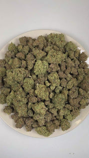 PUFFY Permanent Marker is an indica-dominant hybrid THCa strain, born from the complex cross of Biscotti, Jealousy, and Sherbet BX. The aroma opens with bright citrus notes before unfolding into bold diesel undertones and a pungent, gassy finish. Visually, dense forest green buds with purple hues and fiery orange pistils are coated in sticky trichomes. Consumers often report a blissful euphoria that uplifts the mood, sparks creativity, creates gentle tingling sensations, and envelops the body in deep, relax