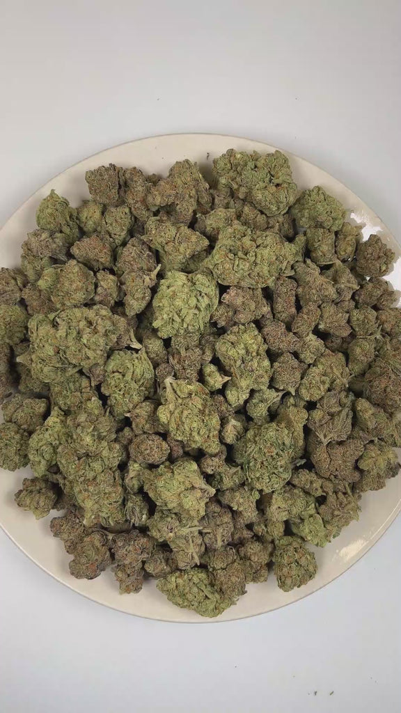 PUFFY Permanent Marker is an indica-dominant hybrid THCa strain, born from the complex cross of Biscotti, Jealousy, and Sherbet BX. The aroma opens with bright citrus notes before unfolding into bold diesel undertones and a pungent, gassy finish. Visually, dense forest green buds with purple hues and fiery orange pistils are coated in sticky trichomes. Consumers often report a blissful euphoria that uplifts the mood, sparks creativity, creates gentle tingling sensations, and envelops the body in deep, relax