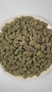 PUFFY Chem I95 is a balanced hybrid THCa strain crafted from the legendary pairing of Chemdawg and I-95. The aroma is a bold blend of skunky, kushy, and diesel notes, creating a pungent and unmistakably potent fragrance. Visually, dense deep green buds with purple hues and fiery orange pistils are coated in sticky trichomes. Consumers often report a euphoric mental lift paired with heightened focus and creativity, gradually giving way to deep body relaxation and soothing stress relief.