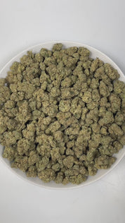 PUFFY Cherry Rage is a balanced hybrid THCa strain, born from the renowned fusion of Super Buff Cherry and Kut Throat Kandy. The aroma opens with a bold gassy punch layered with ripe cherry sweetness and a nostalgic candy-like finish that lingers pleasantly on the nose. Visually, dense green buds with hints of purple are threaded with fiery orange pistils and coated in a sparkling layer of sticky trichomes. Consumers often report a happy, euphoric head high that elevates mood and gradually melts into a rela