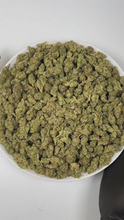 PUFFY Black Cherry Gelato is an indica-dominant hybrid THCa strain, crafted from the legendary lineage of Black Cherry Funk and Acai (Gelato). The aroma opens with sweet, ripe cherry notes, layered with fresh herbal nuances and a grounding earthy undertone. Visually, the buds are compact and resinous, showcasing rich forest-green tones with occasional purple accents, bright orange pistils, and a sparkling layer of trichomes. Consumers often report an uplifting, euphoric, and focused cerebral high that gradu