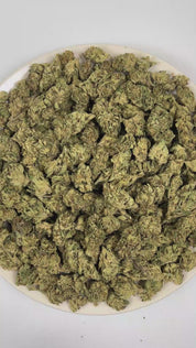 PUFFY P85 is an indica-dominant hybrid THCa strain crafted from a dynamic fusion of  Legend’s Ultimate Indica (LUI) and Bubblegum. The aroma opens with crisp sage, layered with warm cedar and a refreshing burst of eucalyptus. Visually, dense vivid green buds with purple hues and fiery orange pistils are coated in sticky trichomes. Consumers often report a euphoric uplifted mood accompanied by enhanced mental clarity, a boost in creativity, and socially engaging energy. 