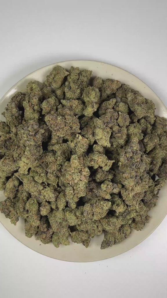 PUFFY Chocolate Kush is a lush indica THCa strain carefully crafted from a distinctive blend of Mazar and an unknown pure indica strain. The aroma features rich chocolate notes complemented by fresh pine and a bold, gassy scent. Visually, dense deep forest green buds with purple hues and fiery orange pistils are coated in sticky trichomes. Consumers often report feeling euphoric, creative, and relaxed, along with an increased appetite.