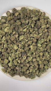 PUFFY Pinnacle (smalls) is a balanced hybrid THCa strain emerging from the distinguished pairing of Slurty 3 and Gush Mints. The aroma is rich with crisp pine and earthy woody notes, finishing with a subtle musky depth. Visually, dense lush green buds with purple hues and fiery orange pistils are coated in sticky trichomes. Consumers often report feeling euphoric and uplifted, with a focused yet deeply relaxed sense of calm. 
